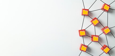 Data storage and file management concept. Network of red blocks with folder icons connected by lines, symbolizing cloud computing, digital archiving on a white background with copy space.