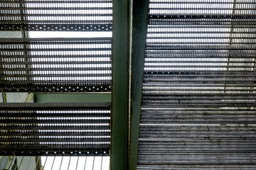 Industrial metal stairs leading upwards abstract pattern
