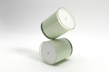 Elegant pale green candles for aromatherapy creating a relaxing modern ambience in a home decor setting