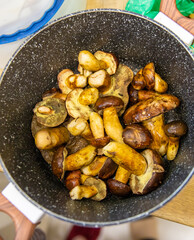 Mushrooms collected in the forest. Selective focus.