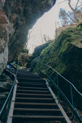 Trail through cliffs: staircase framed by nature