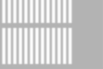 Modern sunlight streaming through blinds creates a dynamic geometric pattern perfect for backgrounds or overlays