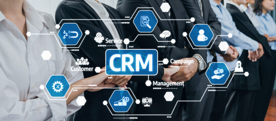 Dynamic scene featuring business professionals engaged in customer relationship management concepts, highlighted by modern graphics and digital icons, symbolizing teamwork and innovation. Amity