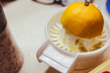 Squeezed lemon in a colander