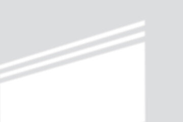 Sunlight casting geometric shadows and lines on a clean minimalist background, perfect for design.