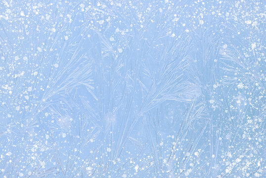 Soft blue frost texture with delicate ice patterns and subtle snowy sparkles. Gentle winter background ideal for holiday cards, seasonal designs, packaging, and calm atmospheric visuals - Powered by Adobe