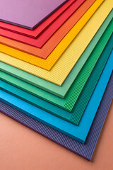 Multi-colored paper background made from cardboard sheets