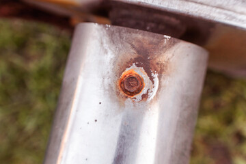 Rust-damaged bolt on old equipment