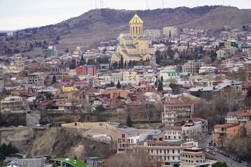 View of the Old Town of Tbilisi, Georgia, with the ancient Narikala fortress towering over it.