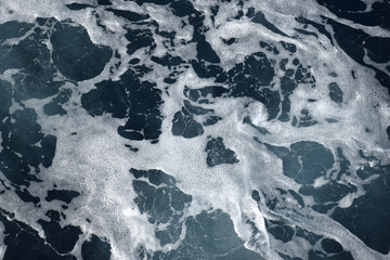 The beach foam in the sea is pure like silk