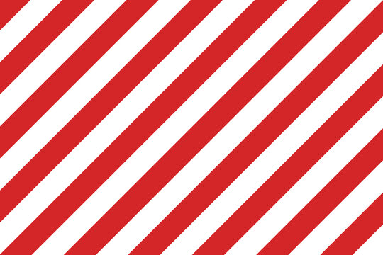 Seamless striped candy cane pattern for Christmas or New Year decoration. Red and white diagonal stripes background. Christmas gift wrapping paper. Winter holiday gift wrapping paper.