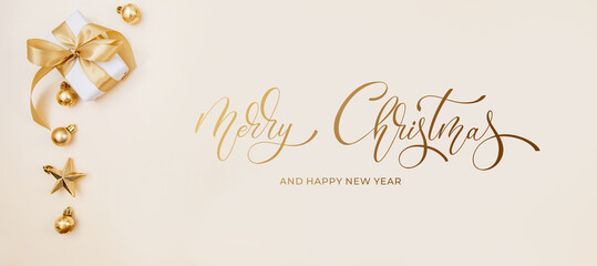 Merry Christmas and Happy New Year greeting card, frame, and banner. Holidays design. Noel and Feliz Navidad. Christmas gifts and decorations, top view. Flat lay.