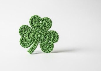 A single green sparkly shamrock clover symbol of luck isolated on white background