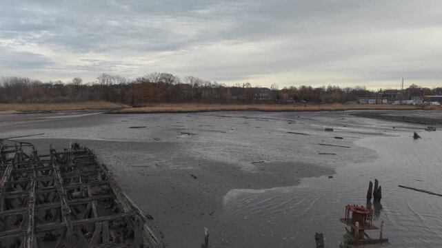 flying backwards reveal of Staten Island Boat Graveyard