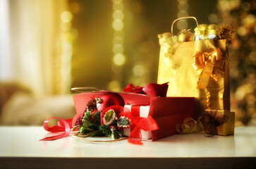 Gifts on table of a Christmas decorated living room