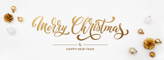 Merry Christmas and Happy New Year greeting card, frame, and banner. Holidays design. Noel and Feliz Navidad. Christmas gifts and decorations, top view. Flat lay.