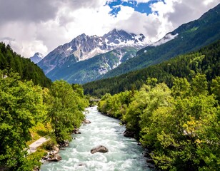 River flows between lush green trees and rocky mountains under a cloudy sky