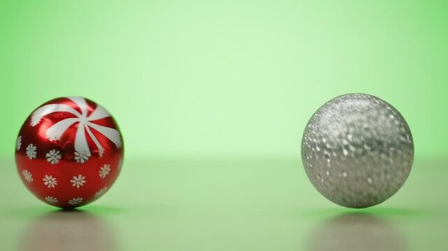 Festive Christmas Candy and Ornaments with Green Background for Holiday Cheer and Decoration