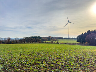 Single Wind Turbine Over Patchwork