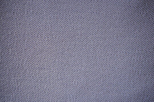 purple fleece fabric texture, macro texture fleece  violet fabric photo above as background	
