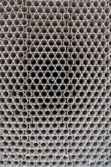 Stack of cylindrical cardboard tubes.