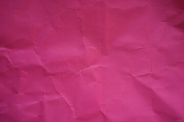 pink crumpled paper texture as background, old kraft paper as background, crumpled packing material texture as background photo above	
