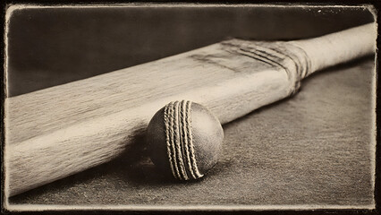 Professional cricket ball with humidity beads on red leather surface in controlled storage environment