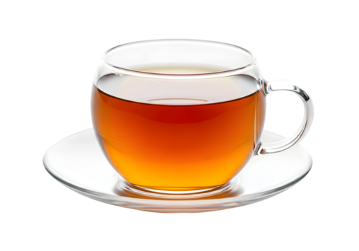 A clear glass mug filled with amber tea on a white saucer