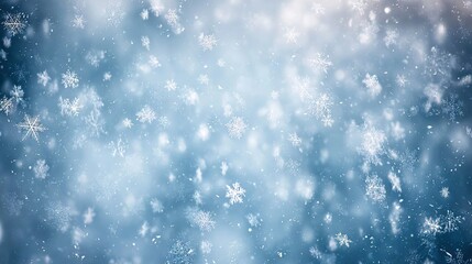 Fototapeta premium precipitation. Softly falling snowflakes in a winter scene with a cool blue atmospheric glow. travel magazines, destination branding, designed for outdoor magazines and nature guides.