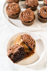 Chocolate Cupcake Sliced in Half on Kitchen Counter