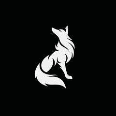 White wolf silhouette sitting on black background