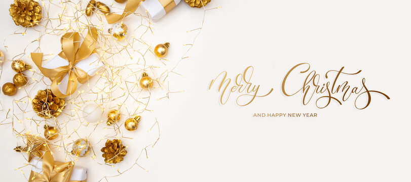 Merry Christmas and Happy New Year greeting card, frame, and banner. Holidays design. Noel and Feliz Navidad. Christmas gifts and decorations, top view. Flat lay. - Powered by Adobe