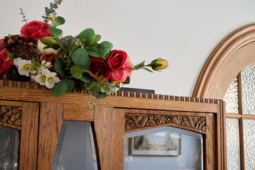 bouquet of flowers on a kitchen sideboard
