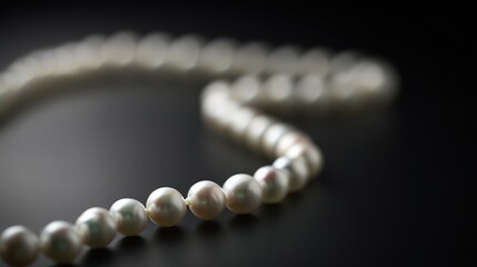 luster. A single strand of pearls arranged in curves on black velvet with soft lighting. lifestyle magazines, social media lookbooks, designed for lifestyle magazines and social media content.luster. 