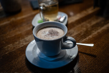 cup of coffee  on a wooden table