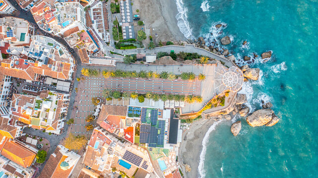 Aerial photo from drone to Balcony of Europe in Nerja resort town on Costa del Sol Mediterranean sea coast at sunsetin Andalusia, Spain. 