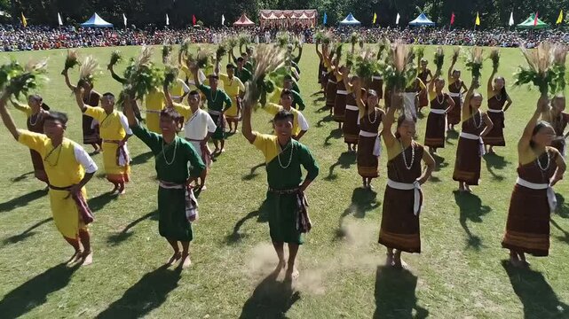 Traditional khasi dancers perform seng kut snem festival ritual on green field in meghalaya india celebrating indigenous culture