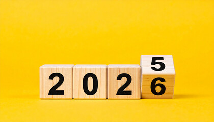 Wooden cube blocks showing 2025 changing to 2026, countdown calendar, New Year, fresh start