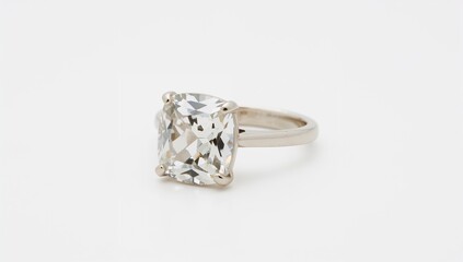 Cushion cut vintage gemstone ring displaying soft square curves on plain white background