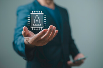 A business professional presenting a digital security chip icon with a lock symbol, representing data protection, cybersecurity, encryption technology, secure access, and modern IT security solutions.