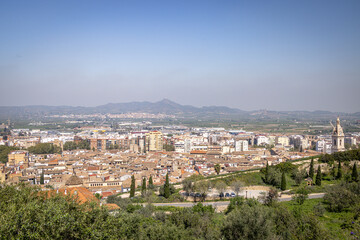 View over  X&agrave;tiva, with mountains behind,  X&agrave;tiva, Spain