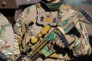 French soldier in combat gear during a military exercise.