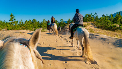Horse Riding In Nature Sand Dunes Group Tour Outdoor Trip Scenic Landscape Adventure Travel Experience Countryside Trail Wildlife Freedom Leisure Summer Exploration © Pedro