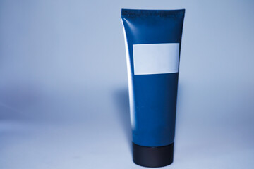 Blank cosmetic cream tube isolated on white background, mockup for skincare packaging