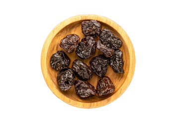 Dried sweet prunes, top view, macro.
