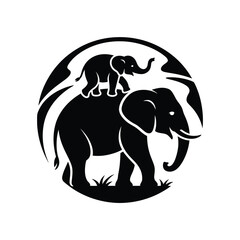 Silhouette of a mother elephant with a baby elephant on her back