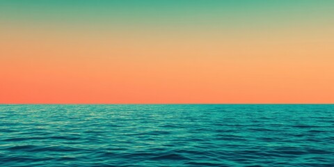 Obraz premium Film grain for color grading, A serene seascape at sunset, featuring tranquil waters reflecting shades of blue and orange, evoking a peaceful atmosphere.