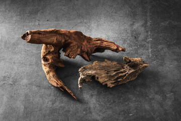 Natural Driftwood Pieces on Dark Textured Background for Decor Use