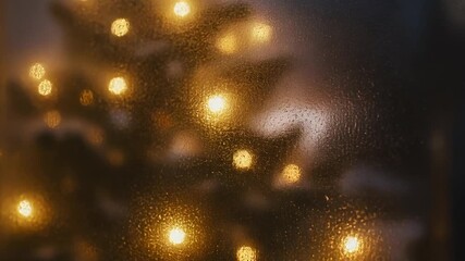 Warm bokeh lights of a holiday tree seen through a frosted glass window at night - Powered by Adobe