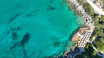 Aerial drone photo of crystal clear iconic beach of Anthony Quinn and small beach of Ladiko, Rhodes island, Dodecanese, Greece